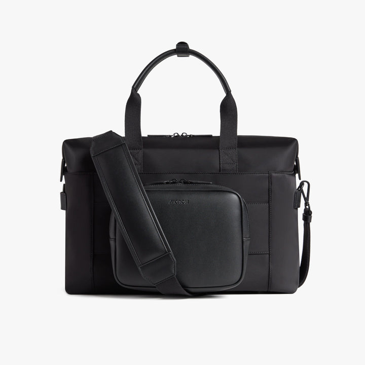 Monos Metro Duffel, Carbon Black, handle up, from the side