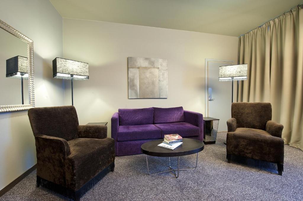 Clean and minimalist room with modern touches at Clarion Collection Hotel Folketeateret
