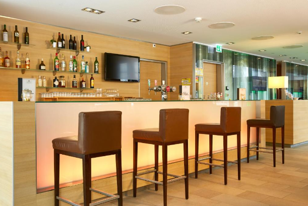 H+ Hotel Zurich bar with a modern design
