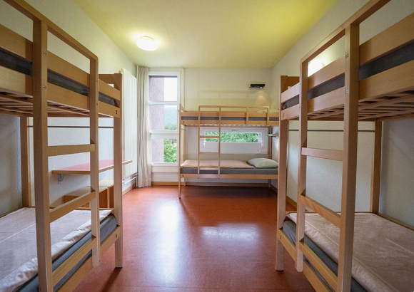 loft beds inside a room at Zurich Youth Hostel 
